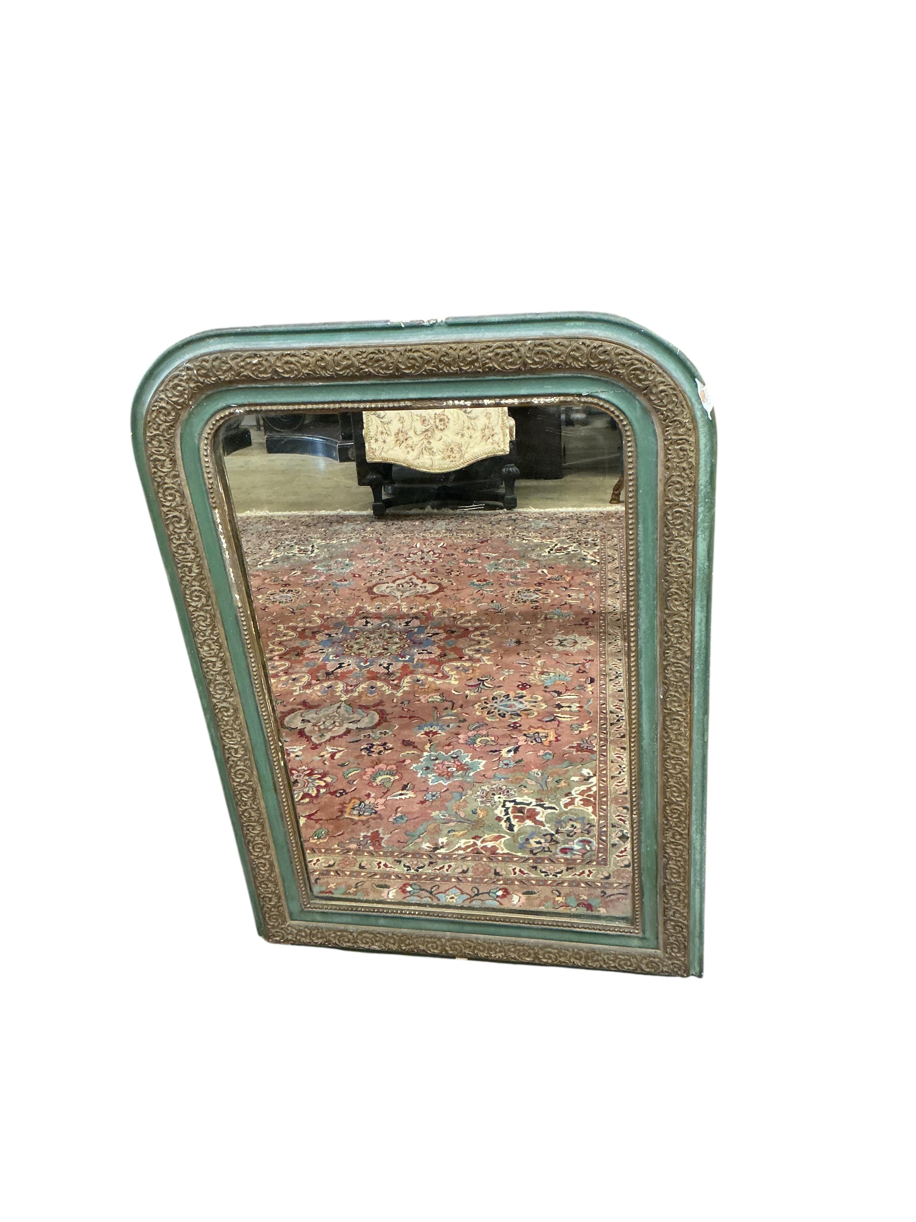 A 19th century wood and composition gilt overmantle mirror, later painted. Width 73cm, height 104cm.